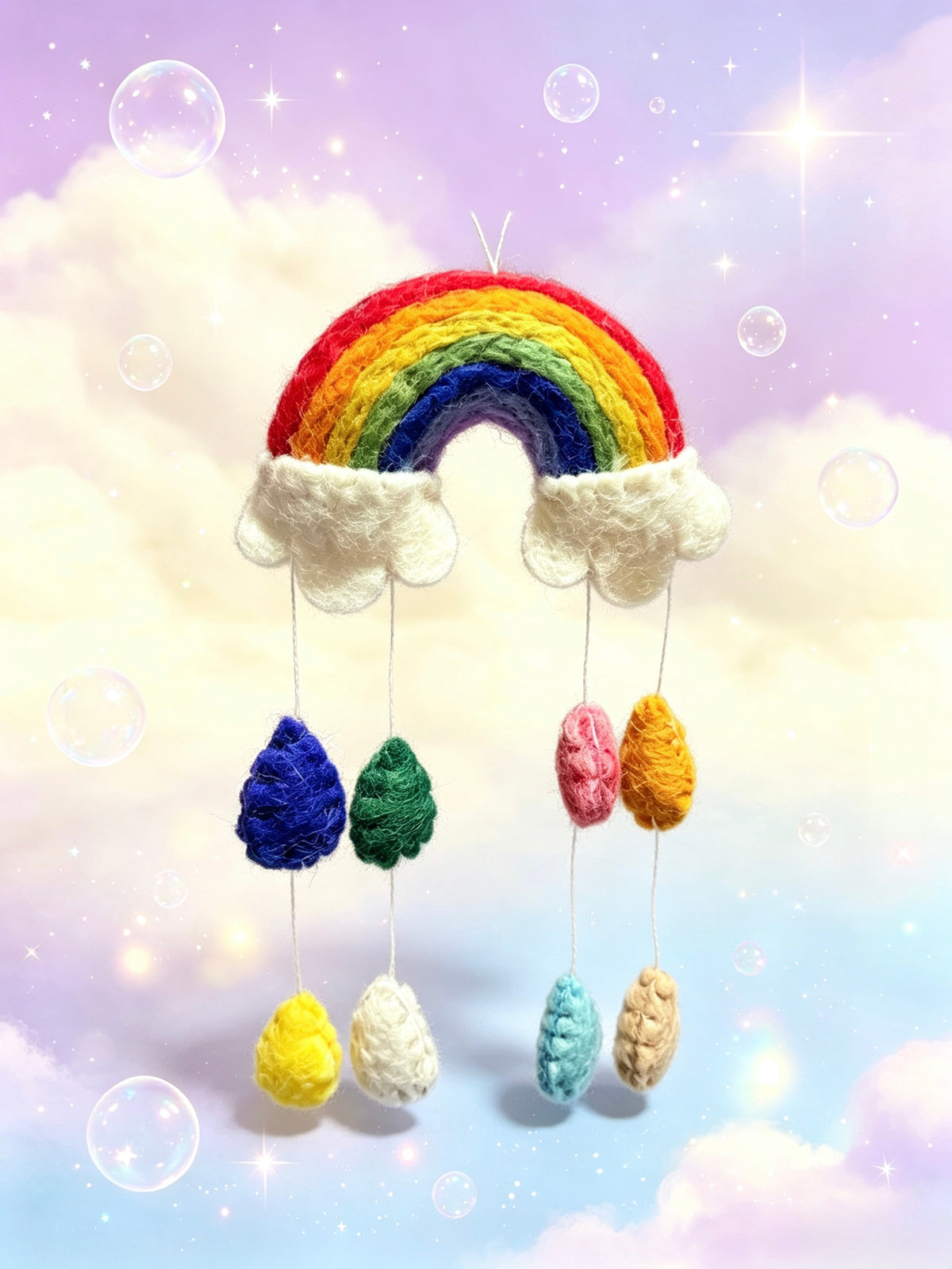 Colourful handmade wool felt rainbow mobile with white clouds and eight hanging raindrops