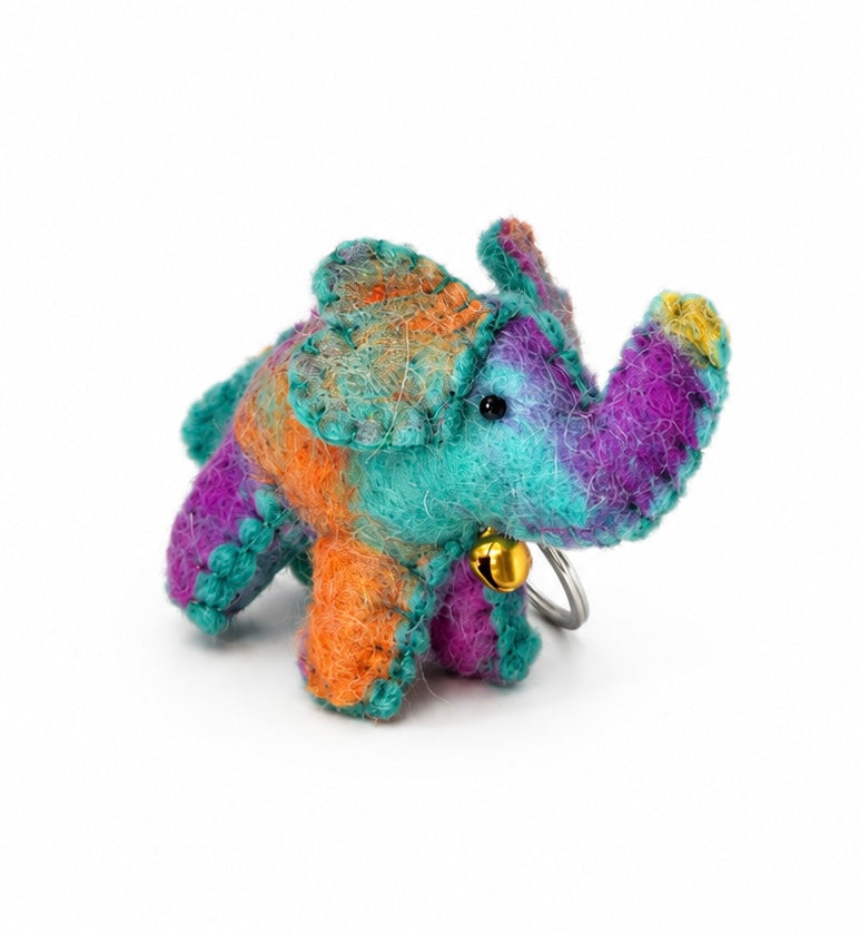 Handmade wool felt elephant keychain hanging from a split ring