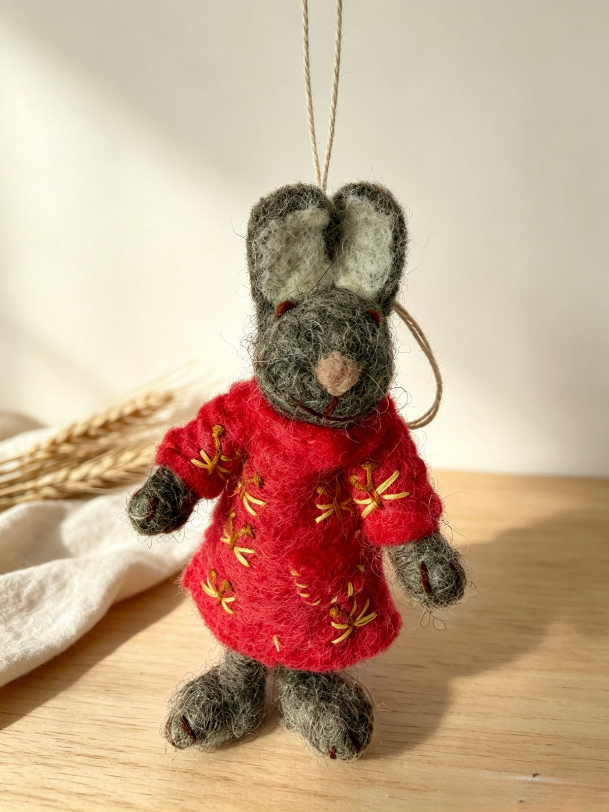 Close-up of handmade wool felt bunny rabbit Christmas and Easter ornament