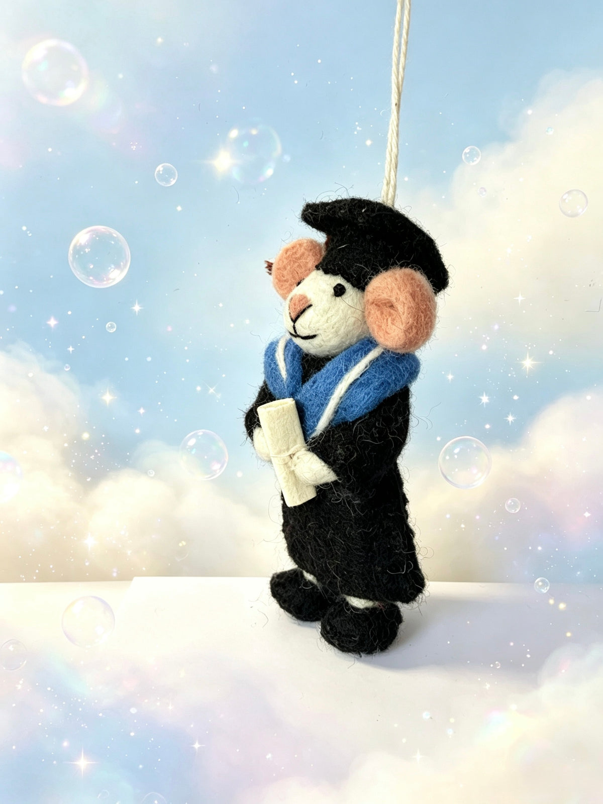 Handmade wool felt graduation mouse degree gift ornament on display